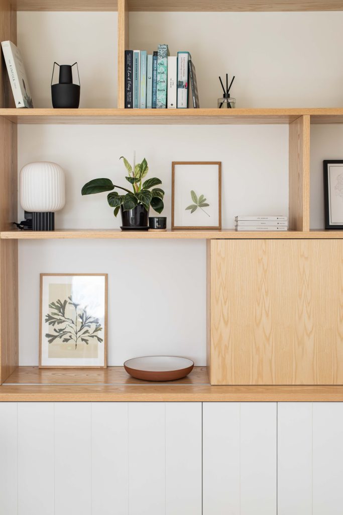 Interior Photography, shelf with photo frames, plants and books | Elyse Kennedy | Meet Margo edit