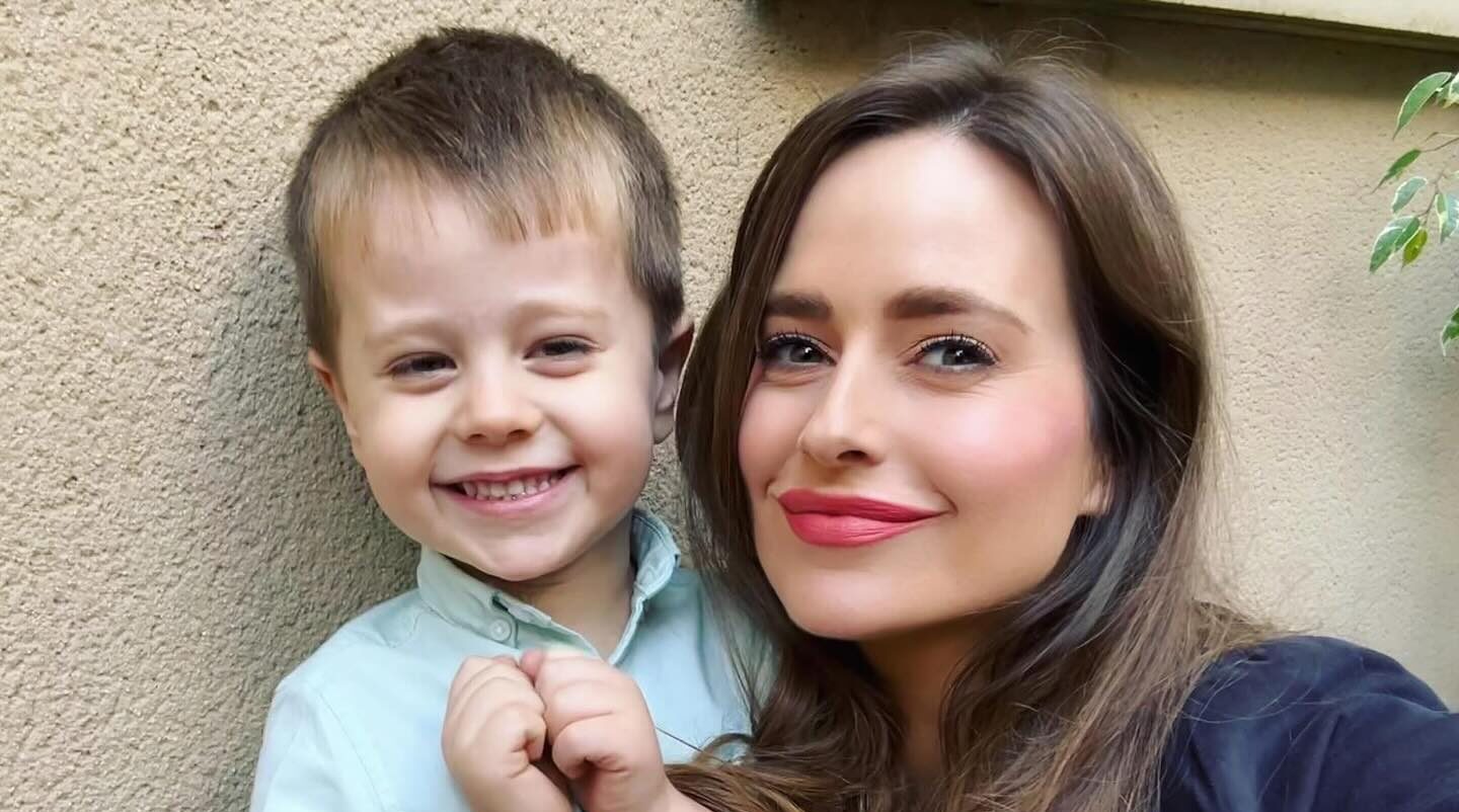 Mother Ellie Thompson is pictured holding her son Billy the brave